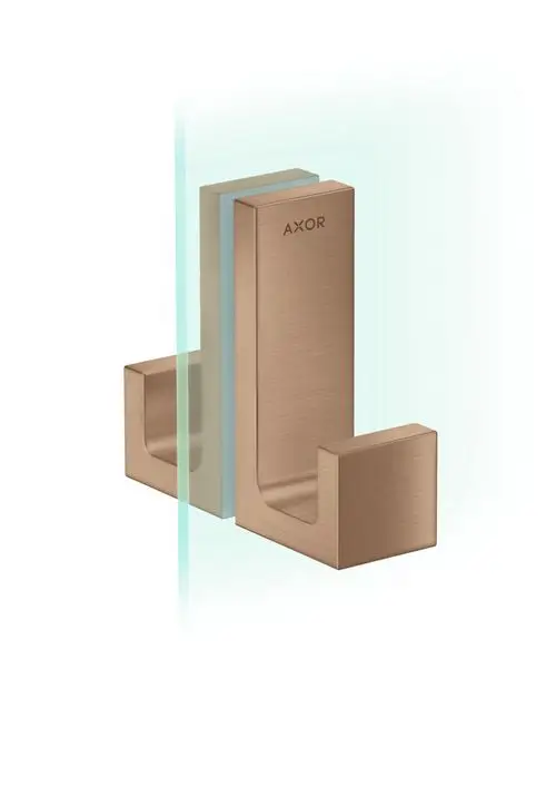 Duschtürgriff von AXOR in gebürstetem Rotgold, rechteckige Form, bestehend aus zwei Profilen, die an einer Glasfläche montiert sind.